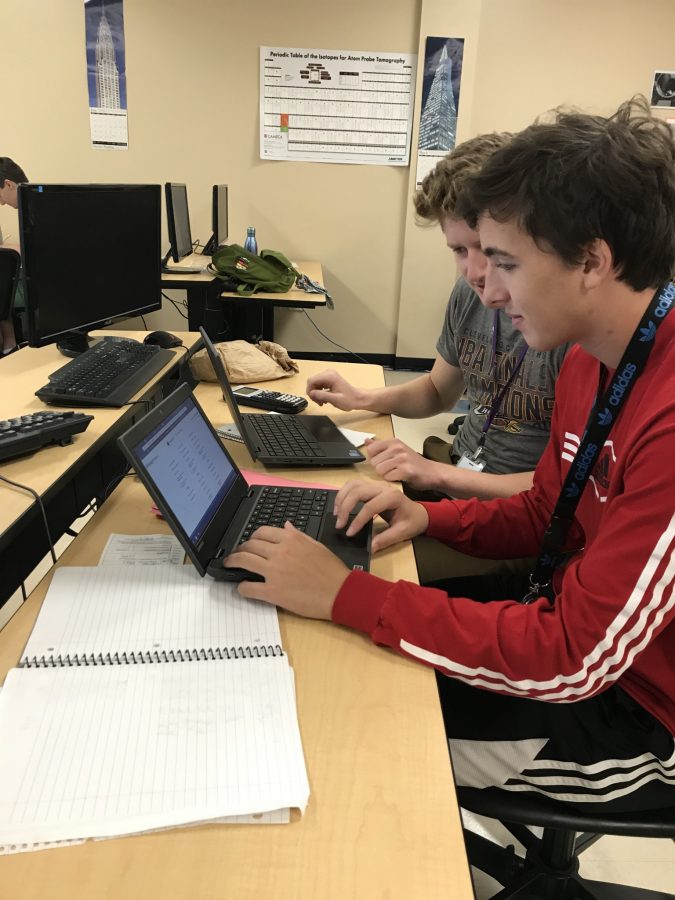Juniors Max Budzar and Sean ODonnell working hard on their new Chromebooks. 