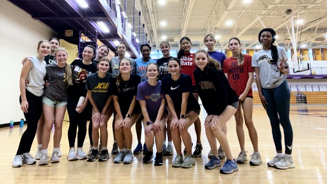 With arms around each other and bright smiles on, these track girls just finished an epic lifting and showed the power of teamwork.  Together, they're unstoppable and their strength is better than before.