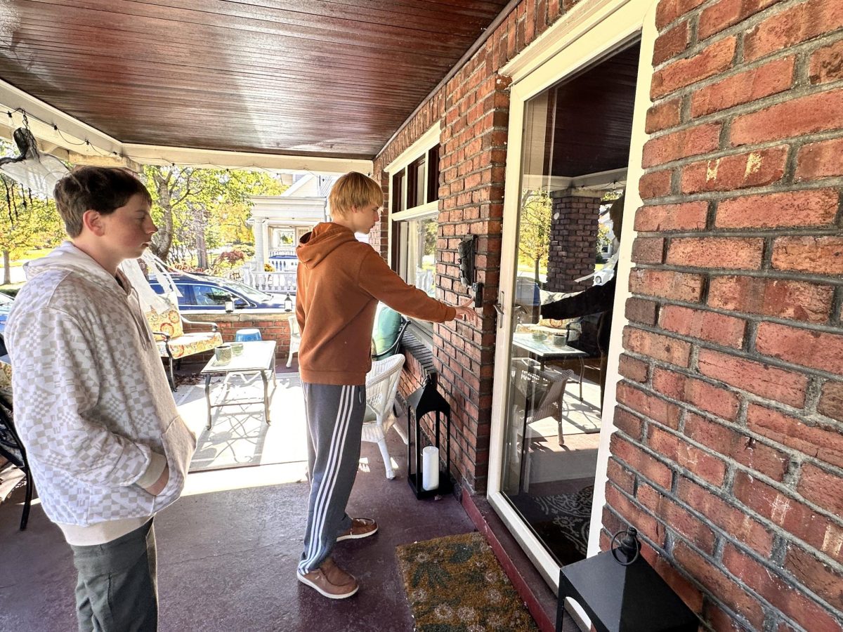 John Grasso and Henry "Hank" Janko going door to door collecting donations and handing out pamphlets.