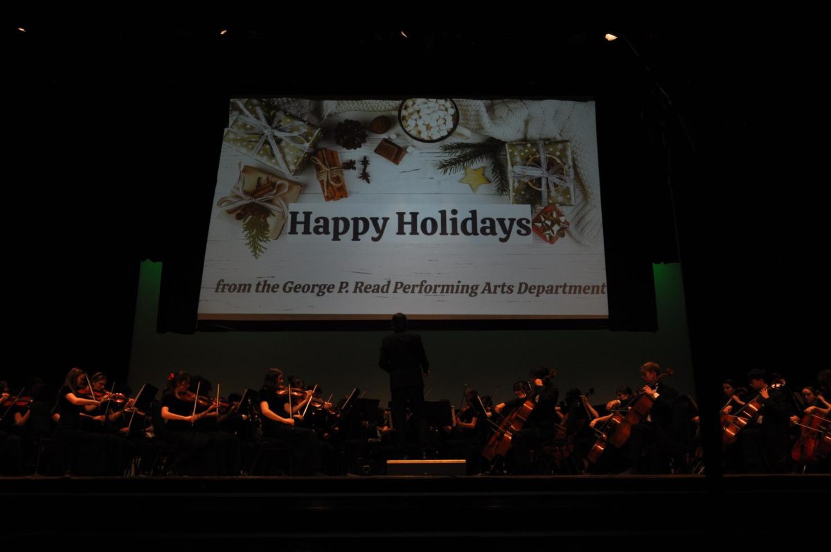 Symphony Orchestra and Wind Ensemble play their encore piece, Most Wonderful Time of the Year, to finish the concert. 