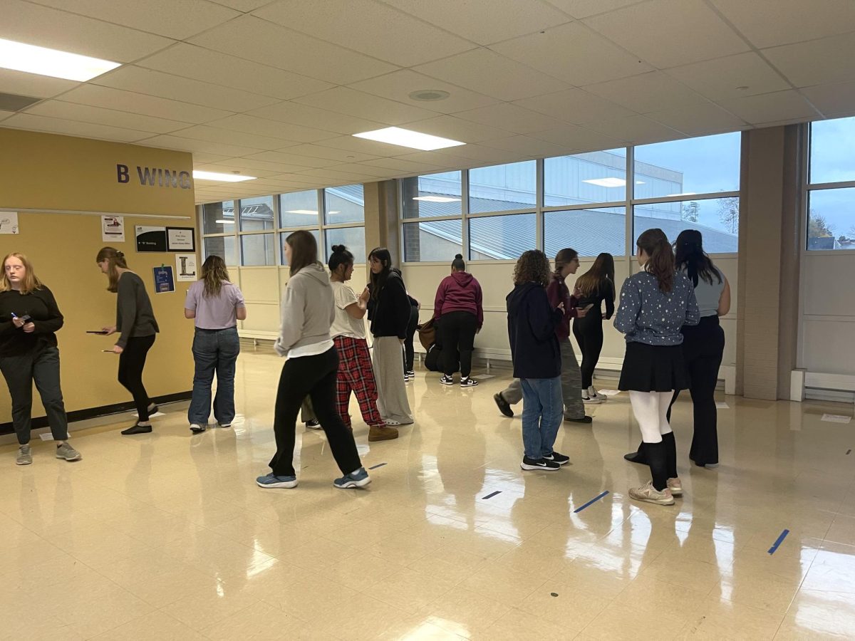 After watching the choreography, Dance Group members sign up for the dances they want to join. 