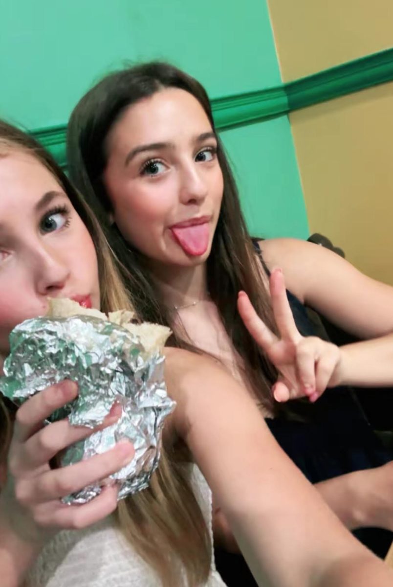 Alice and Mia enjoying burritos and good vibes at Ohio City Burrito. 