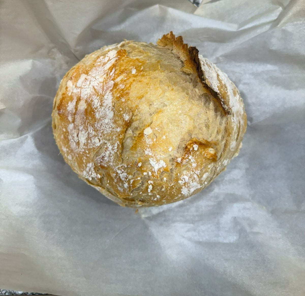 A  sourdough loaf fresh out of the oven.