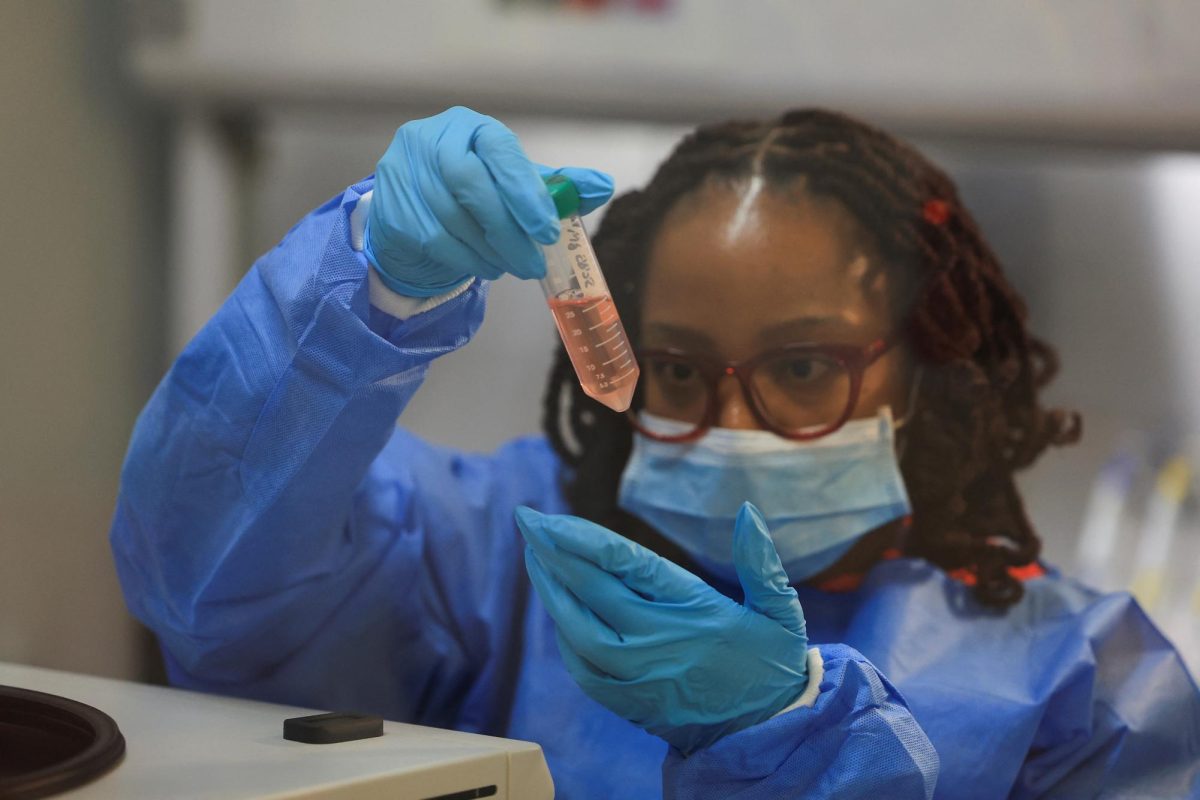 Scientific officer Anathi Nkayi works in the research lab at the University of Cape Town's Institute of Infectious Disease and Molecular Medicine, in Cape Town, South Africa February 17, 2025. REUTERS/Esa Alexander