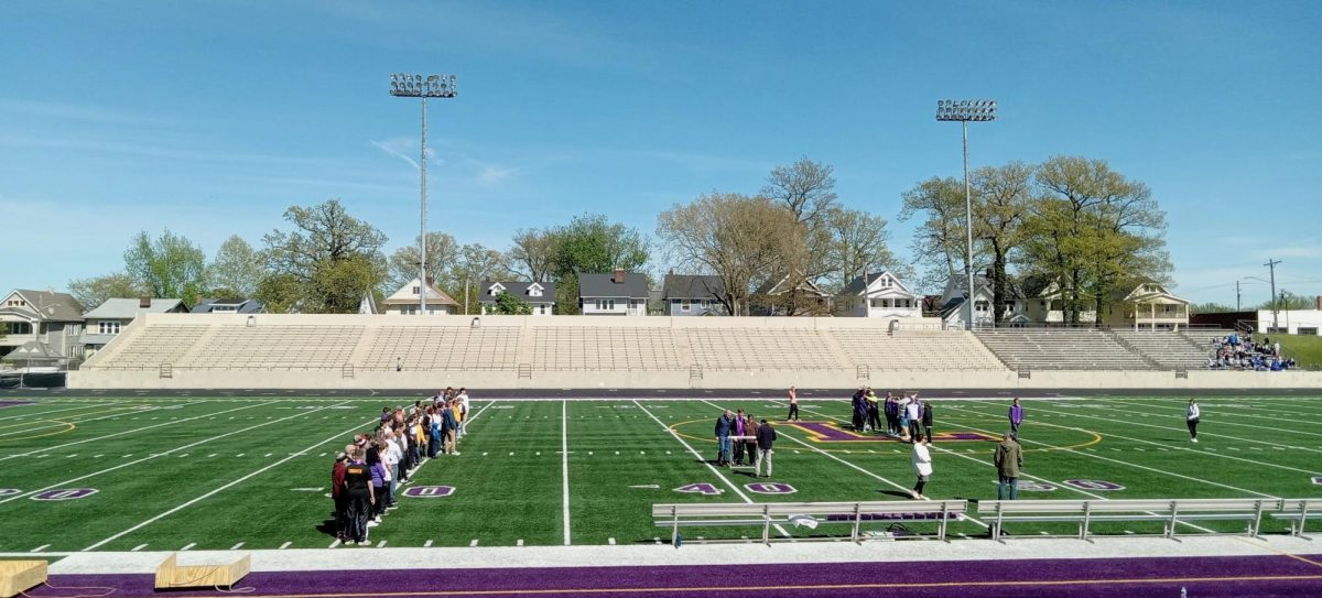 Seniors are announced and accompanied by their parents.