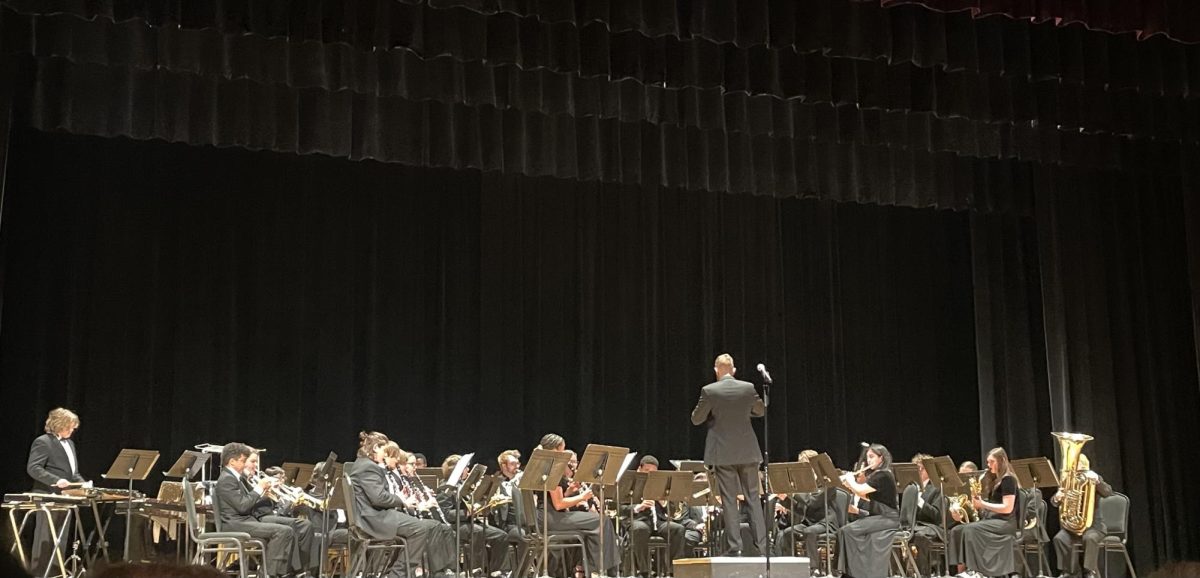 Mr. Steinbrunner conducting the band during the performance