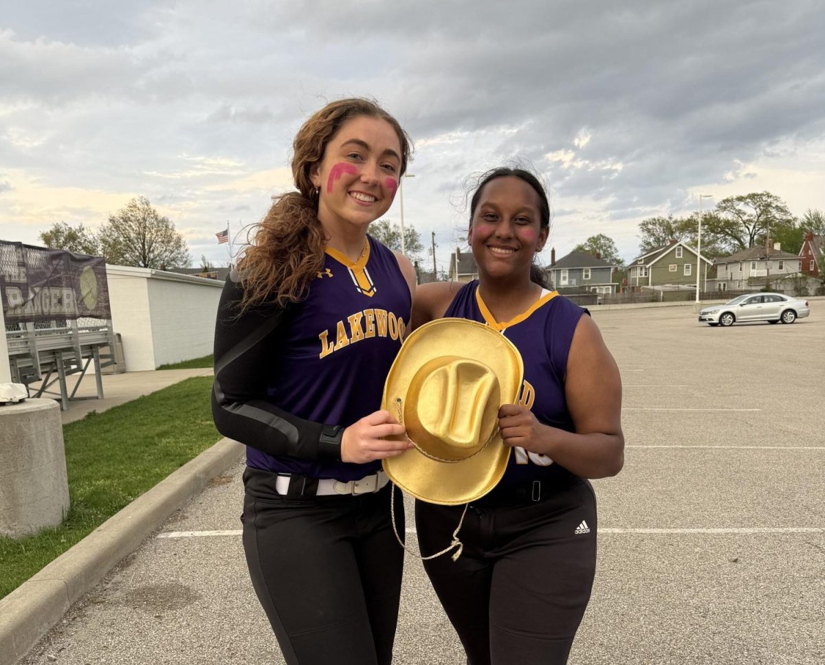 Ella Bower and Marissa Showers smile for a photo after the game in honor of being Rangers of the Game.