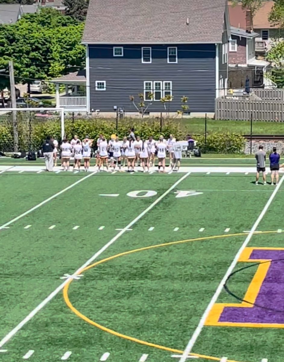 Before the girls' lacrosse game on Saturday, both Lakewood and Padua girls' lacrosse teams stood together for a moment of silence to honor Bay Village and the Veselic family. 