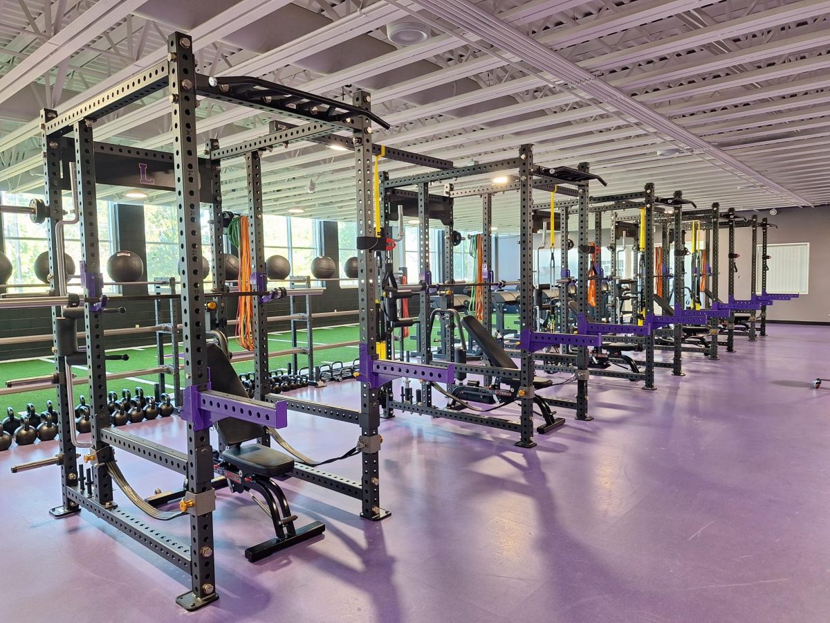 Lakewood High School’s renovated weight room, featuring brand-new racks, benches, and the hanging TRX bands, unveiled in 2024.