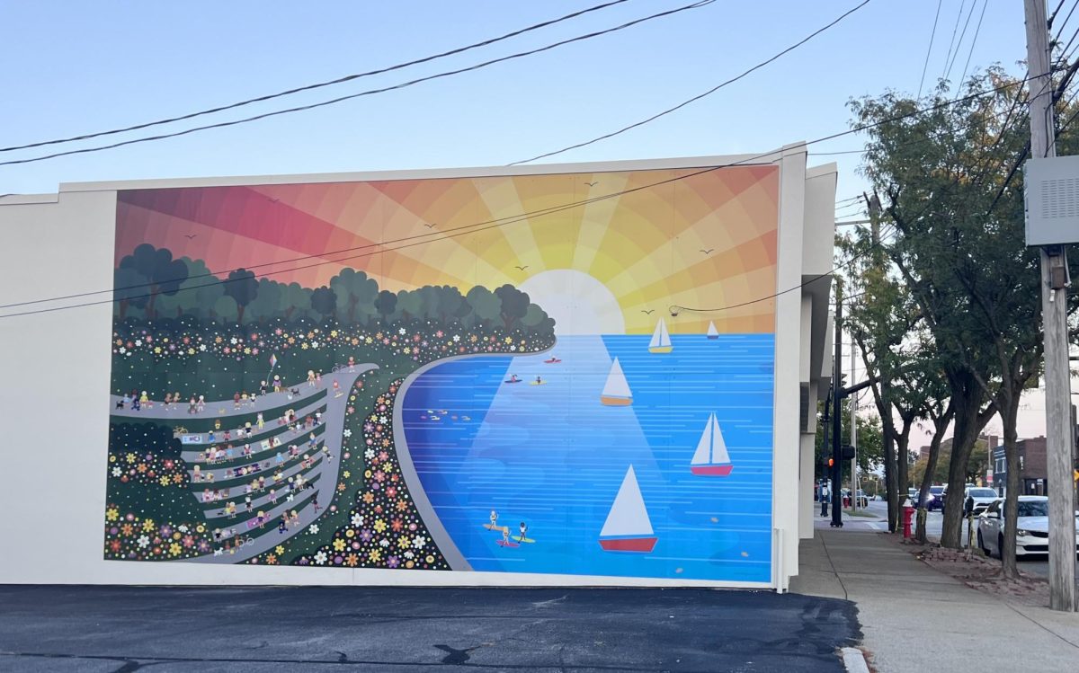 This mural of the Solstice Steps and Lake Erie brightens the side of this plain building, adding new colors and energy.