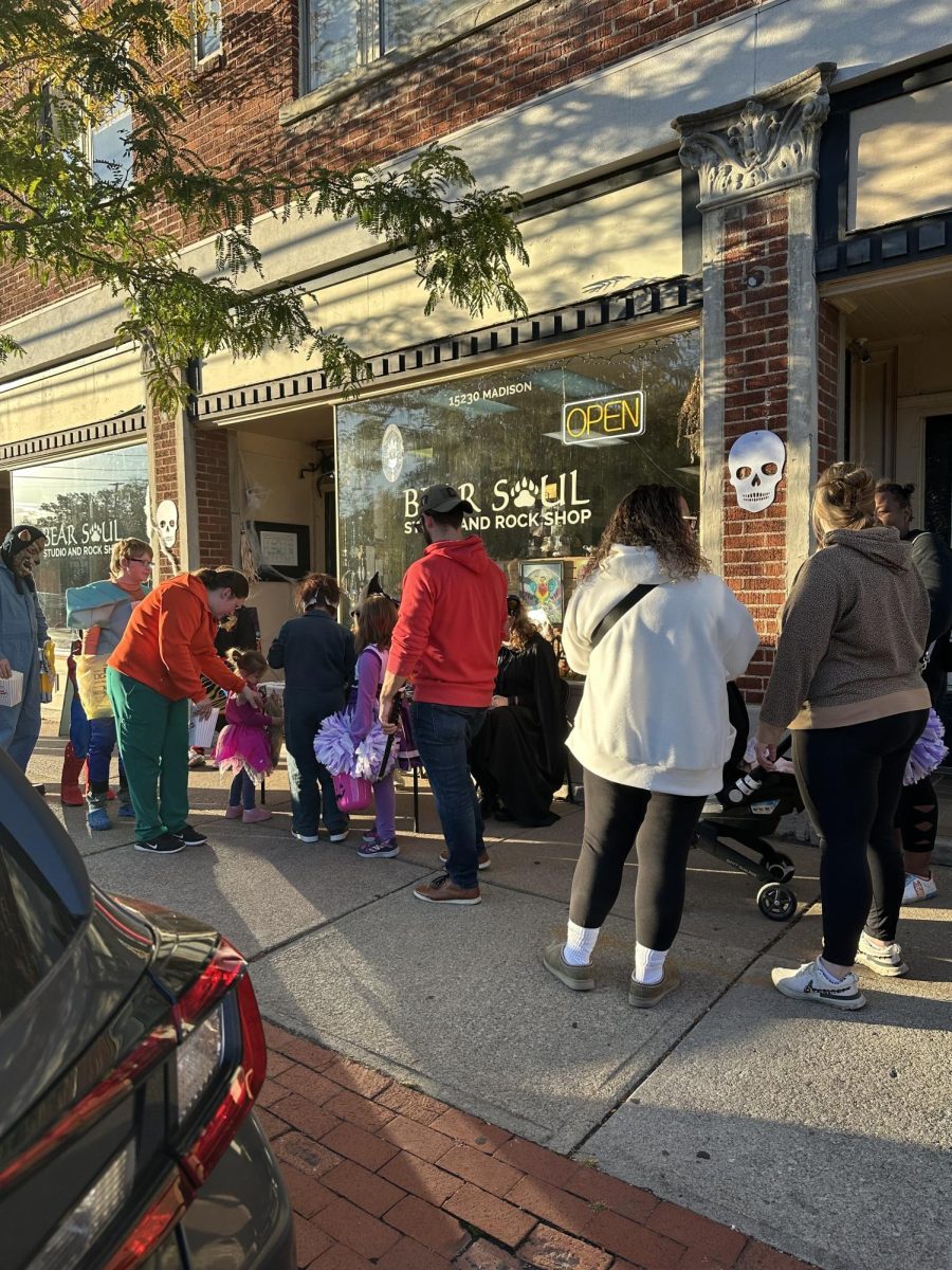 Lakewood families in line, waiting to get candy from local businesses.