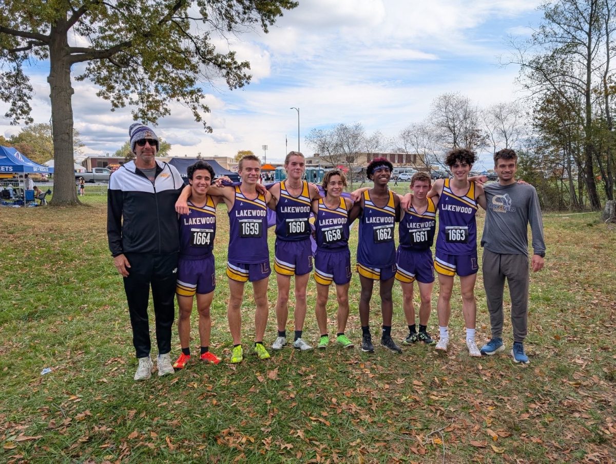 The boys’ varsity cross country team celebrates a great season.