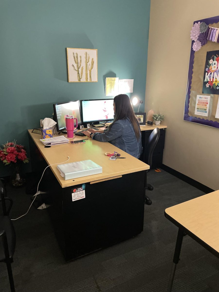 Counselor Lisa Gentry prepping for a student meeting in her office.
