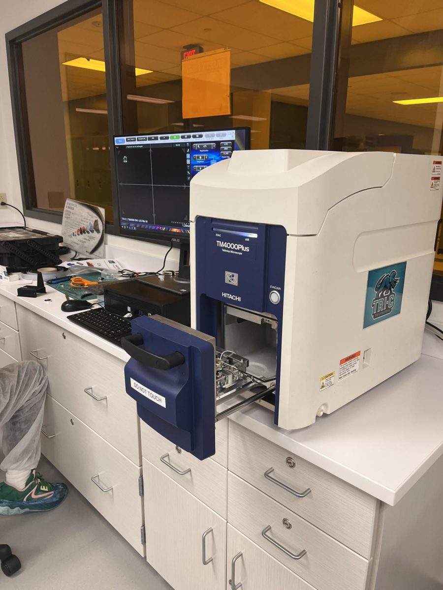 The SEM is open and ready for a sample to be inserted.