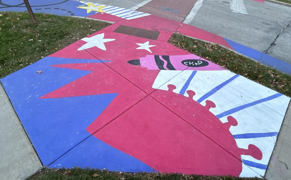 Colorful mural from the Cleveland Mural Company and Hayes Elementary students adorns the corner of Delaware and Olive.