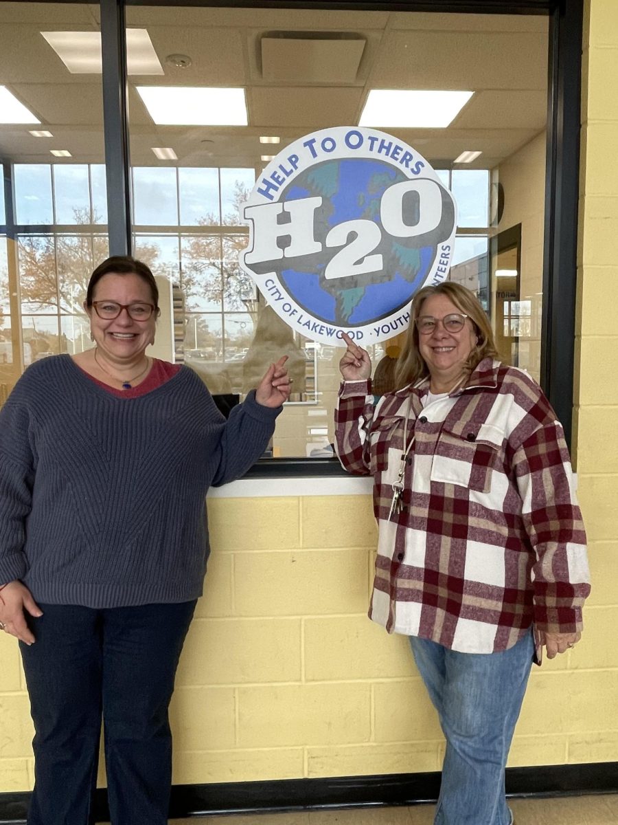 H2O leaders Emmie Hutchinson, left, and Amy Chodzin pose in front of their office located at Lakewood High School.