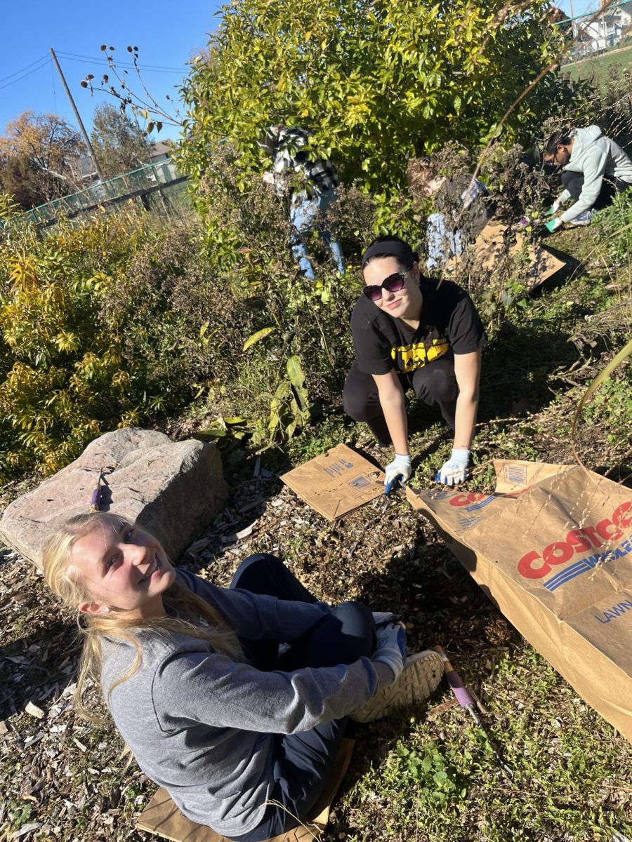 Students give back to the community by working at the Madison Park Community Garden.