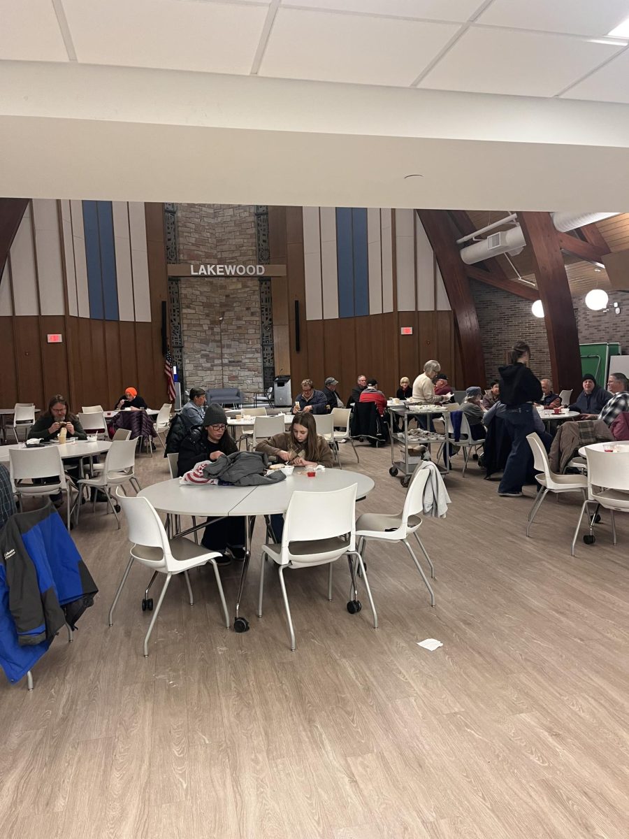 The community is enjoying this heart-warming meal together.