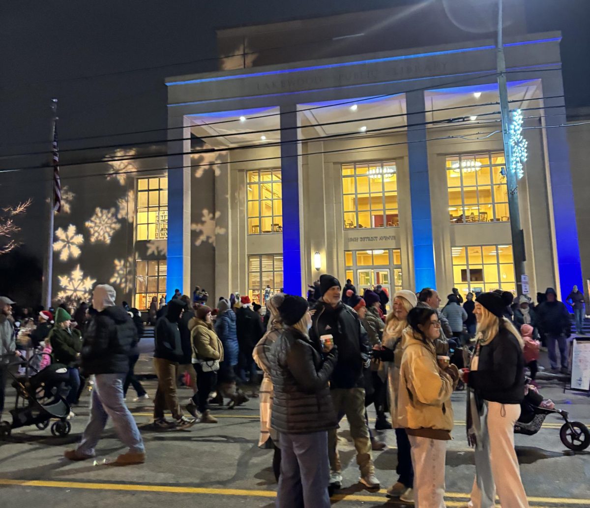 A crowd at Light Up Lakewood gathering to meet Santa, shop, and eat good food.