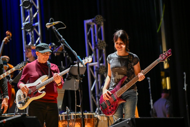 Bassist Stephen Knill and LHS sophomore Ollie Schumacher rehearse for the big night.