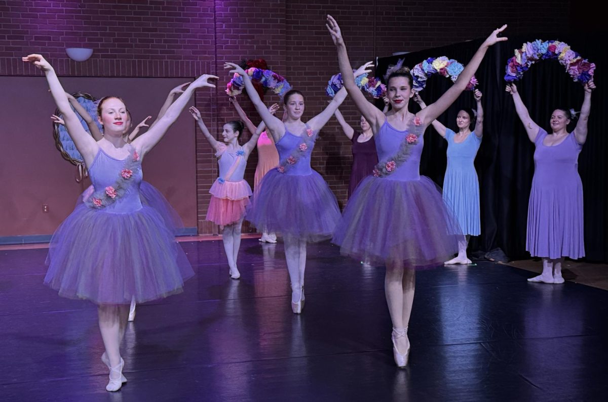 Audrey Willmer, Nidea Stevenson, and Mackenna Muzychenko performing in The Nutcracker. [ Picture Credit: Beck Center ]