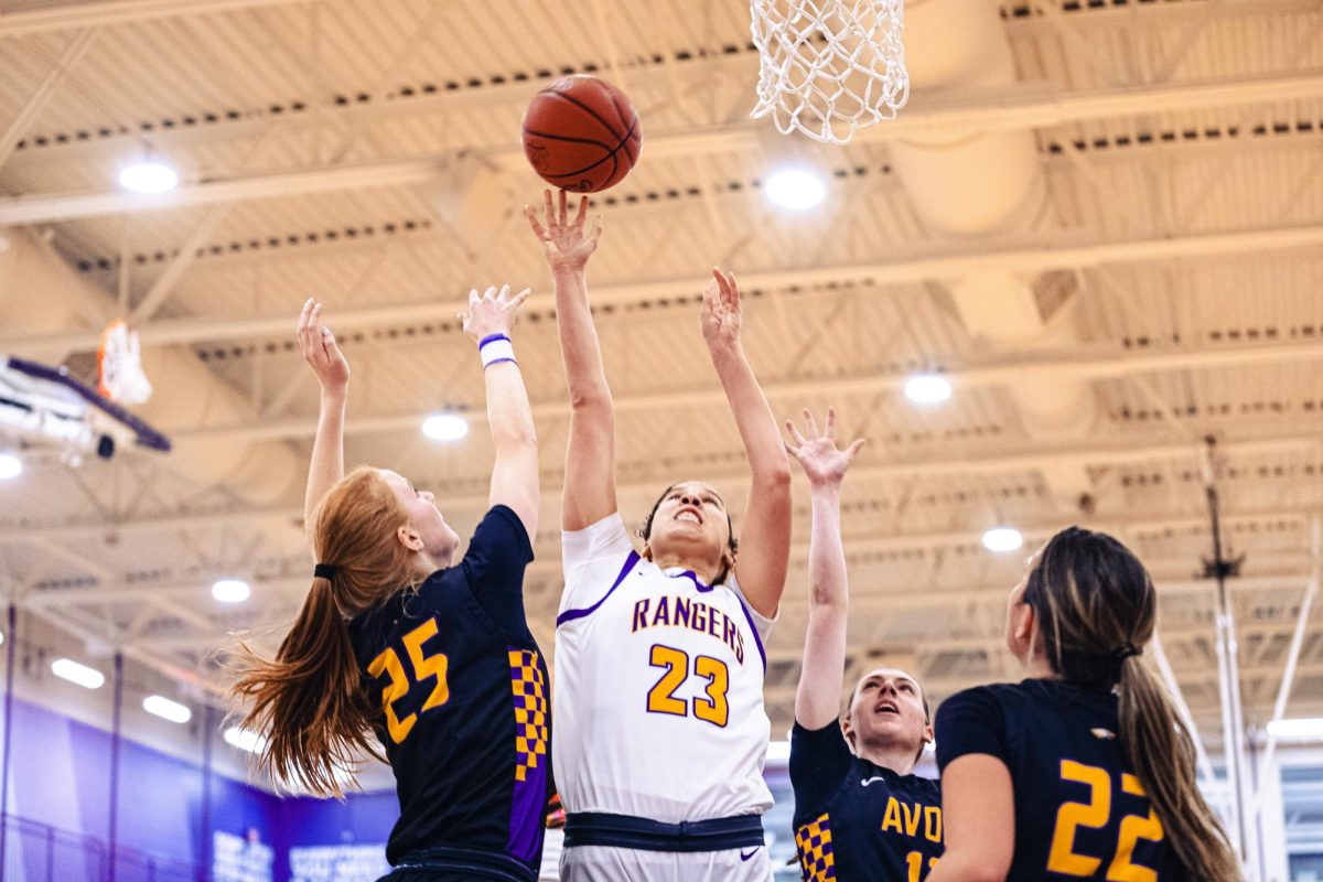 Ariana shoots a contested layup after getting a rebound.