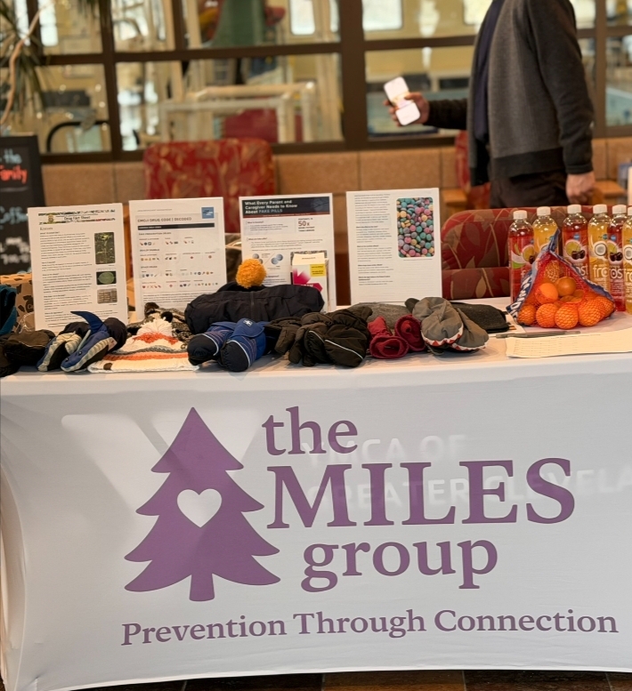 A table with the MILES logo and information about counterfeit drugs. 
