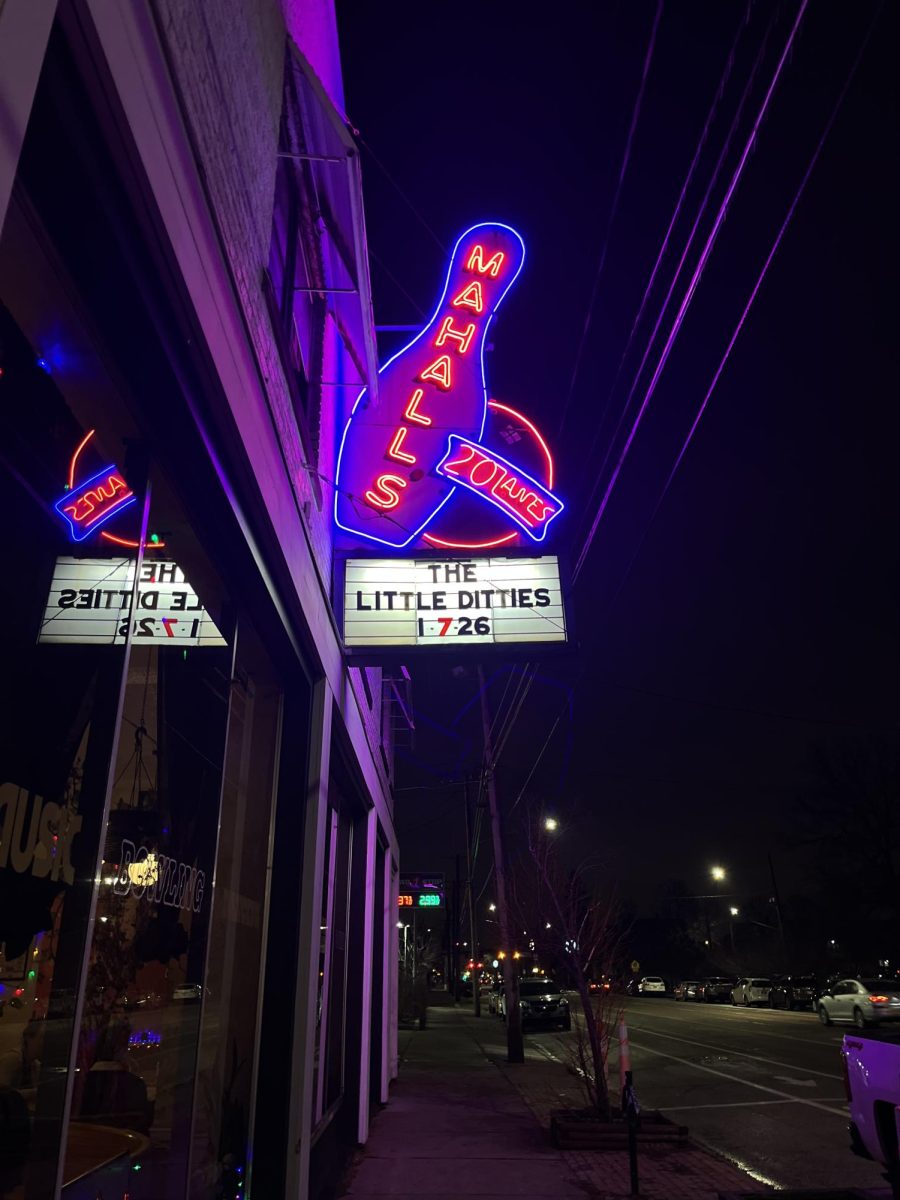The Little Ditties are featured on the sign outside.