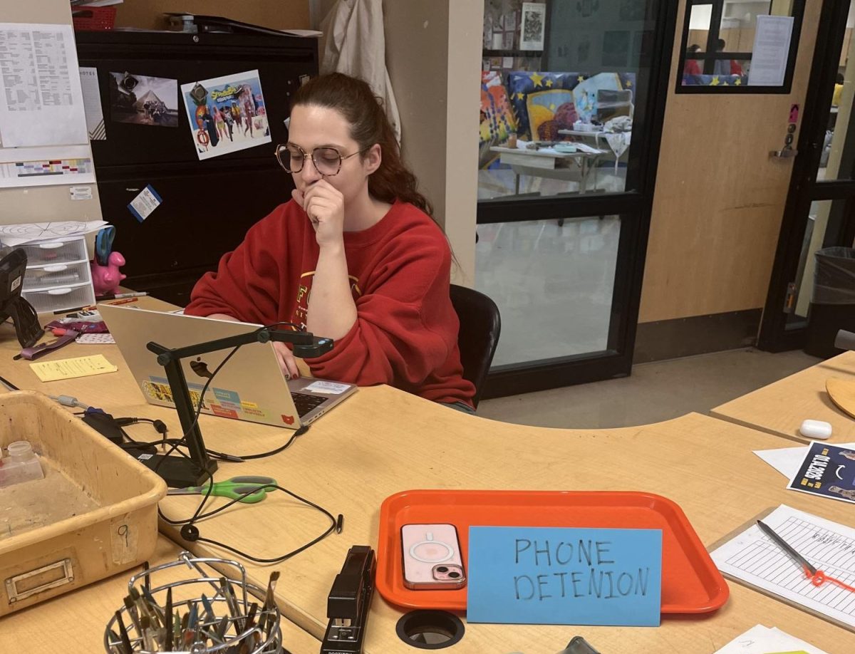 Teacher Mrs. Stazik implements a phone detention, in which students voluntarily put their phones away to reduce distraction. 