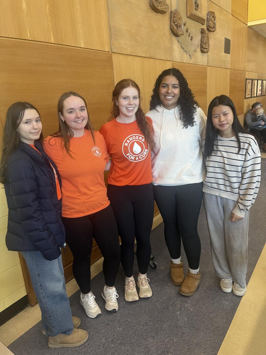 (Left to right) Carissa LaForte, Lydia Koons, Audrey McNulty, Jada Goings, and Victoria Htoo take a picture after a successful event.