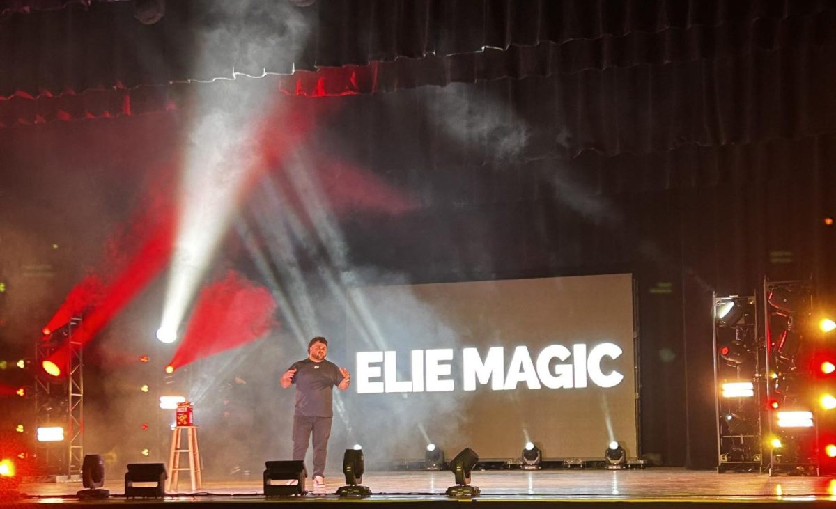 Elie Magic takes the stage.