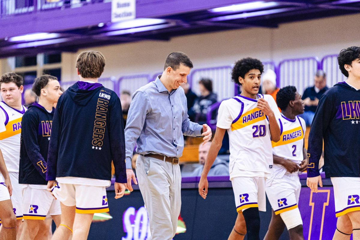 Coach Cammock hypes the team up during a timeout.