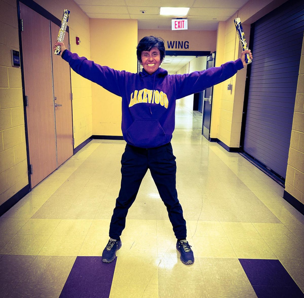 A photo of Coach Hernandez herself, the women responsible for bringing yoga to the LHS distance team.