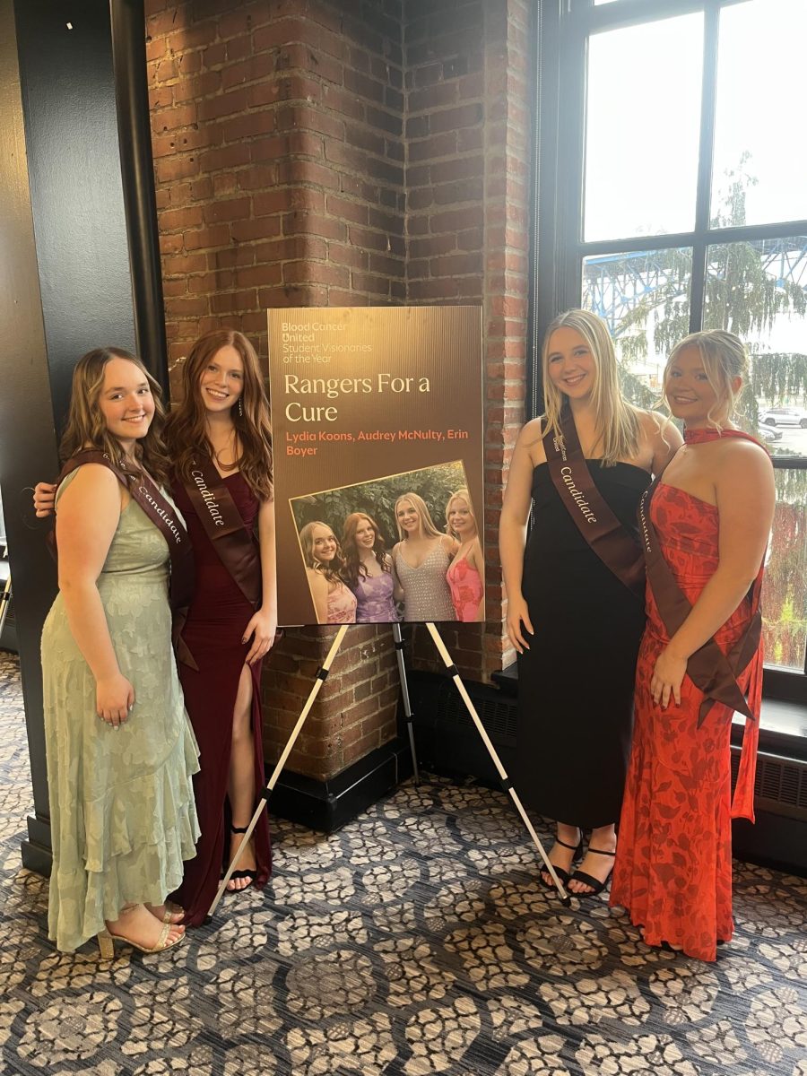 Visionaries Lydia Koons, Audrey McNulty, and Erin Boyer alongside Team Manager Ruby Fraunfelder