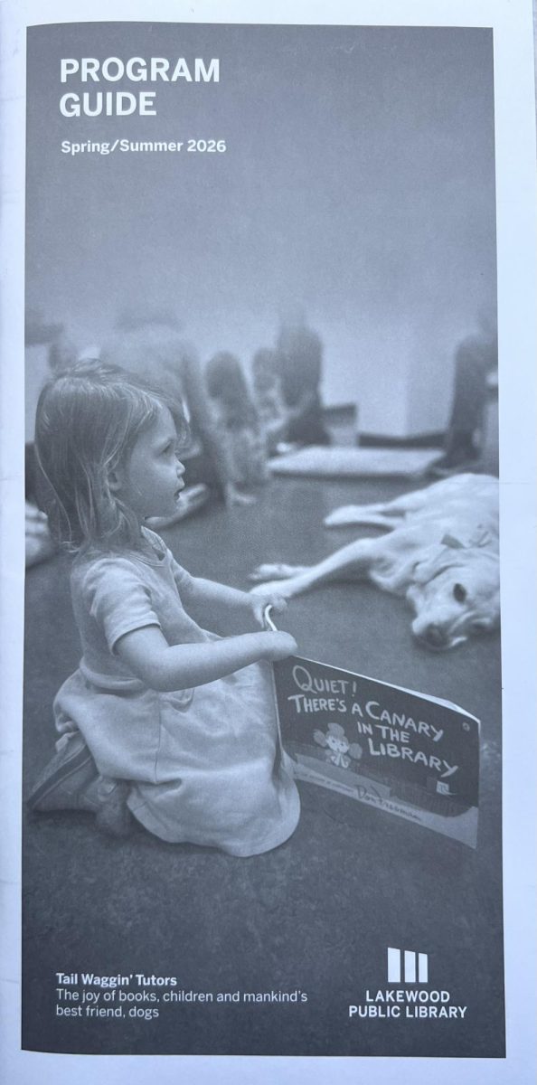 Tail Wagging Tutors is featured on the front of the library’s program guide.