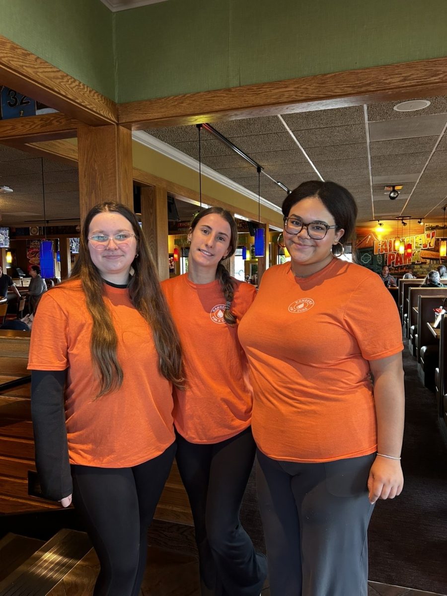 Layla Pierce, Claire Monahan, and Camryn Peterson take a picture together.