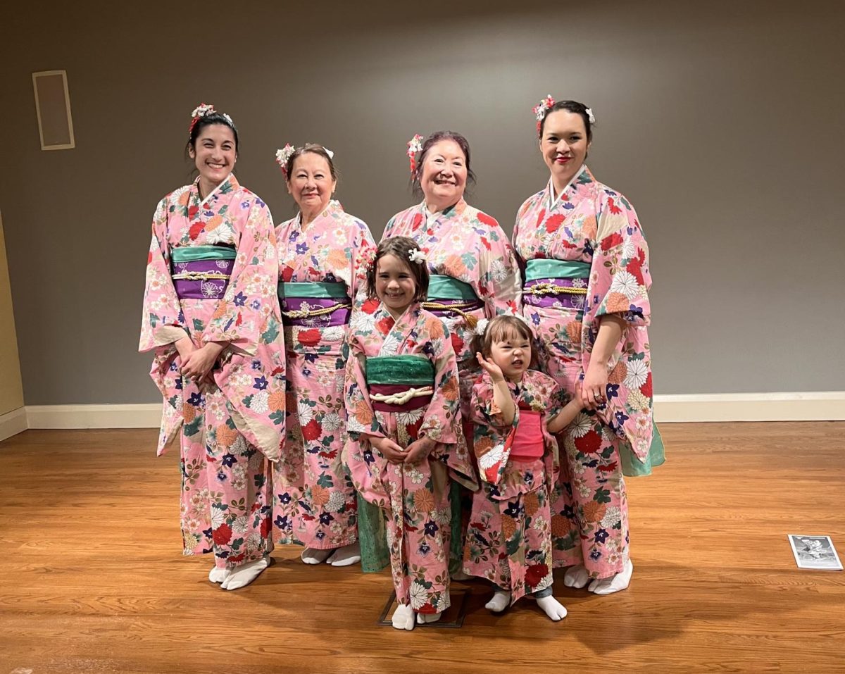The Sho-Jo-Ji dancers pose in the library auditorium.