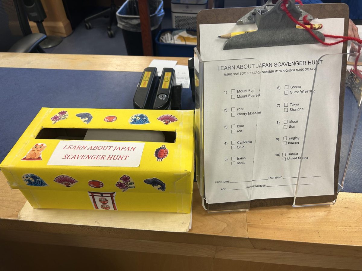 The scavenger hunt station where kids can pick up their clipboards.