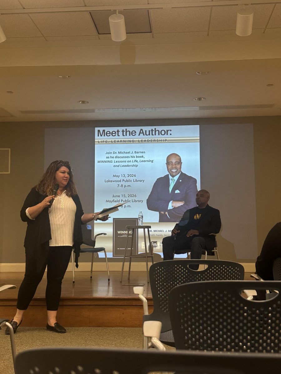 Dr. Michael J. Barnes being introduced to open the meet-the-author panel.
