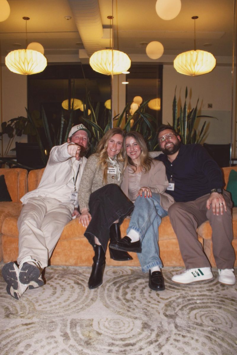 Mike, Stephanie, Kaitie, and Kyle pose for a photo to promote their brand.